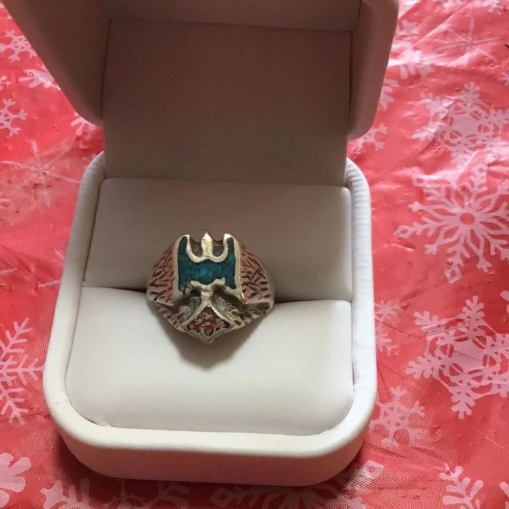 Vintage hand forged thunderbird sterling turquoise and red and coral that can no